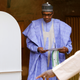 Nigerian President Muhammadu Buhari casts his vote in Nigeria’s presidential election at a polling station in Daura, Katsina State, Nigeria